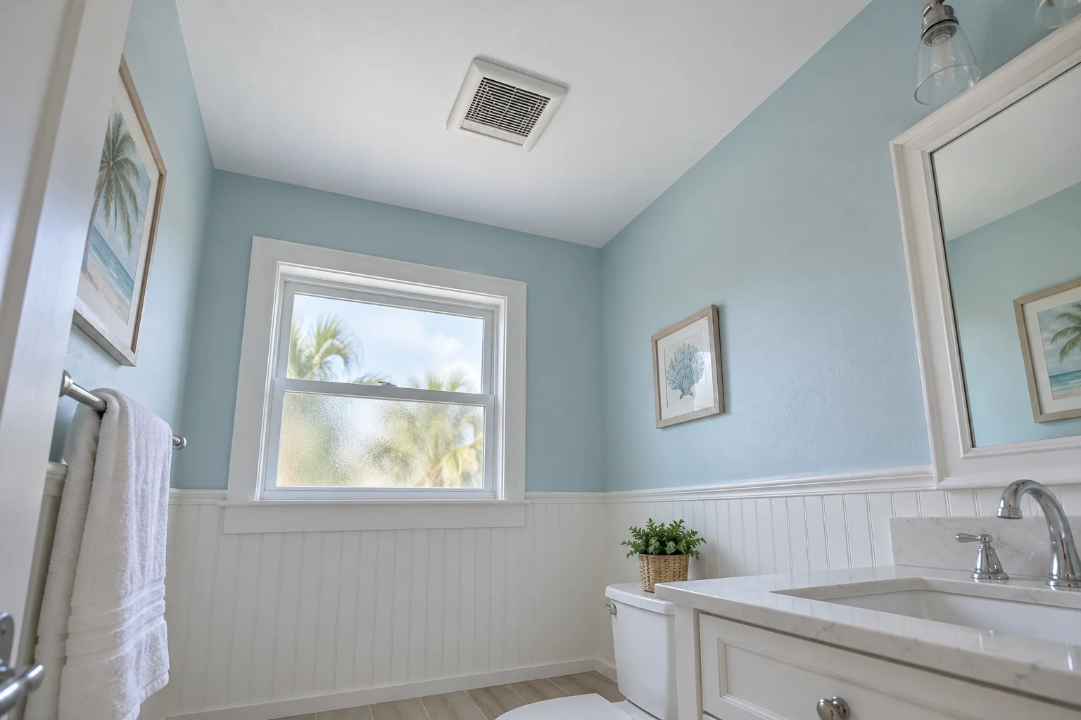Repaired painted bathroom ceiling near a vent.
